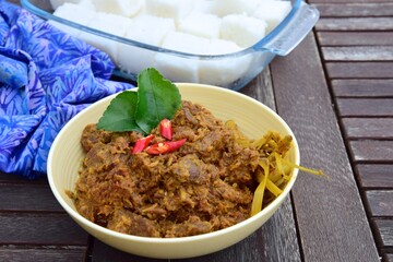Beef Rendang. Traditional Indonesian dish served during Eid al Fitr or Idul Fitri. Served with compressed rice cake or lontong