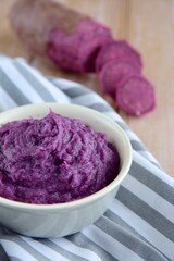 Mashed purple sweet potato. Ube puree - obrazy, fototapety, plakaty