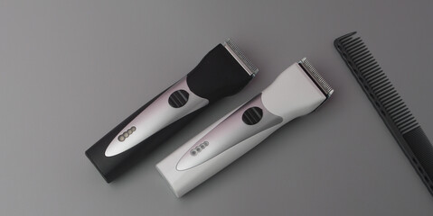Professional Hardressing Tools on a Gray Background.  Two Hair Clippers and Comb. Stylized in Classic Black and White Colors With Metal Blades