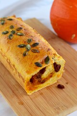 Pumpkin loaf bread with pumpkin seeds and raisin cinnamon sugar filling