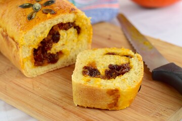 Pumpkin loaf bread with pumpkin seeds and raisin cinnamon sugar filling