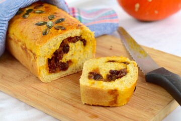 Pumpkin loaf bread with pumpkin seeds and raisin cinnamon sugar filling