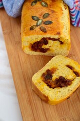 Pumpkin loaf bread with pumpkin seeds and raisin cinnamon sugar filling