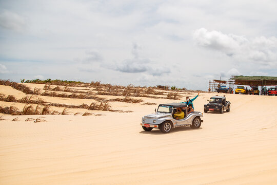 Natal, Rio Grande do Norte, Brazil - March 12 2021: Image of buggy car in the sands of Natal, Rio Grande do Norte, Brazil.