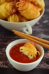 Deep fried prawns wrapped in potato strings
