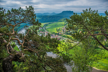 Saxon Switzerland is a unique natural wonder in Saxony, Germany. Sandstone cliffs in green valleys.