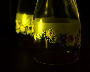 yellowish glasses of wine