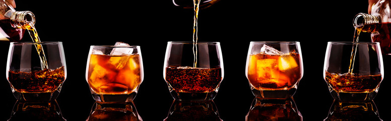 set of whiskey pouring in glasses with ice cubes isolated on black background.