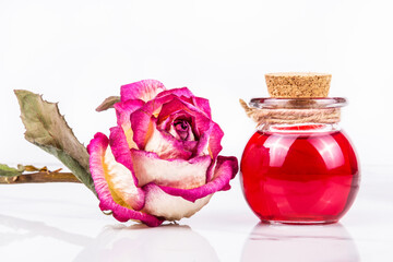 Essential rose oil. Love elixir. Aphrodisiac. Home fragrance