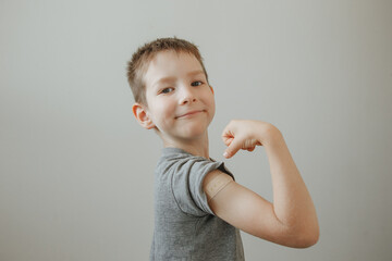 Vaccinated Boy Showing Arm After Covid-19 Vaccine Injection