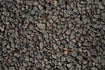 Texture of gravel stones on ground