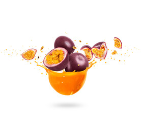 Sliced ripe passion fruits (Passiflora) with splashes of fresh juice, isolated on a white background
