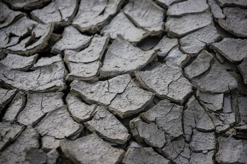 DROUGHT EROSIONED EARTH WITH CUTTING TEXTURE