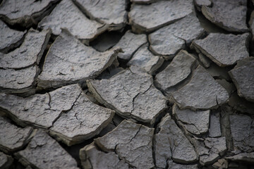 DROUGHT EROSIONED EARTH WITH CUTTING TEXTURE