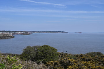 Barry Island, Wales, UK - April 17, 2021: Barry is a vibrant coastal town with a bustling High Street, gorgeous parks and colourful beach huts.