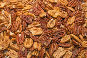 Tasty pecan-nut background. Top view.