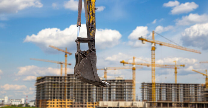 Part of a construction machine (excavator or crane) on the background construction site, industrial image. Moscow, Russia
