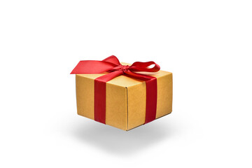 flying box with a red ribbon on a white background with a shadow.  present in beige packaging.  presentation of the gift. 