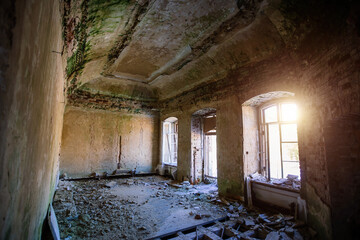 Fototapeta na wymiar Old ruined abandoned historical mansion, inside view