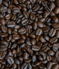 Coffee beans background.Closeup macro roast coffee bean texture.