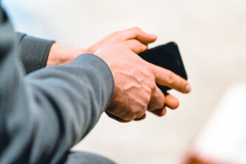 man holding a smartphone in his hands