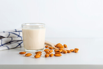 Cooked nuts vegetable drink. Almonds milk in glass. Homemade food concept. Plant based organic veggie milk, lactose free