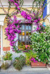 Nice window at an apartment building in Monterosso, Italy. Residential outdoor landscape.