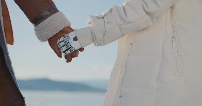 The girl with the bionic hand is taking her boyfriend's hand Bionics Cybernetic Robotic-arm Hand prosthesis Baikal