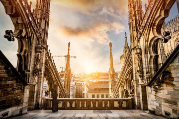 Roof terraces of the famous Duomo Cathedral of Milan against sky