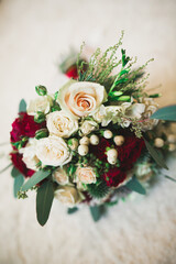 Beautiful wedding bouquet with different flowers, roses