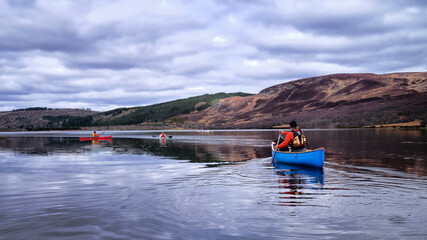 Canoeing and kayaking on Loch Brora in the Highlands of Scotland