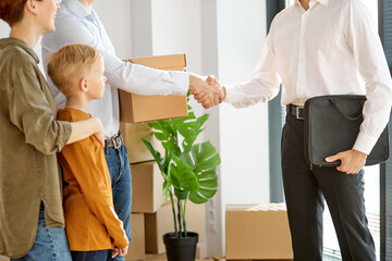 man shaking hand to professional realtor or agent closing deal, satisfied family handshaking consultant or banker