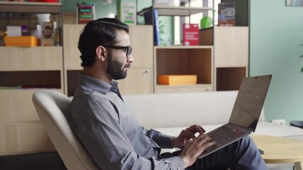 Indian latin business man trader investor analyst looking at financial stock market charts rate dynamic, trading data indexes growth using laptop computer for cryptocurrency digital analytics. - Powered by Adobe