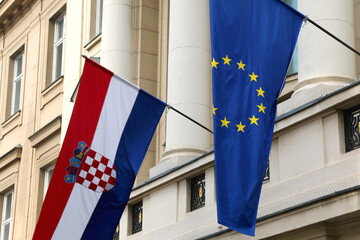 Flags of Croatia and European Union on Croatian Parliament building in Zagreb.
