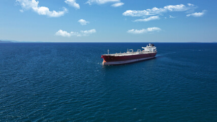 Aerial photo of industrial crude oil - fuel tanker ship cruising deep blue Mediterranean sea
