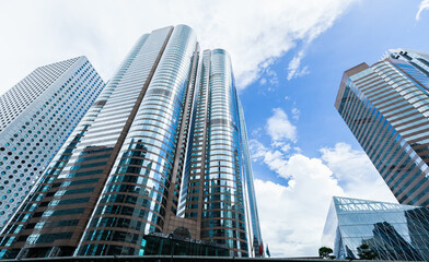 Fototapeta na wymiar Perspective view of modern commercial skyscrapers