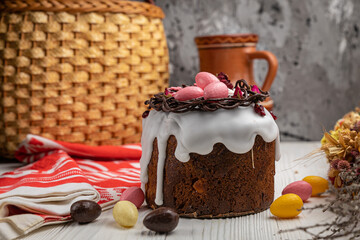 Easter cakes on a white wooden table.
