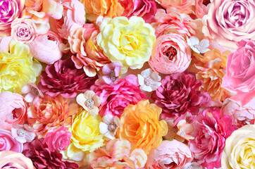 Colorful roses and small flowers background. Beautiful, good for holidays and gift.