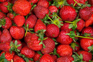 background in the form of ripe strawberries