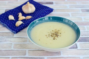 Cauliflower garlic sauce with black pepper on top