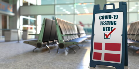Obraz premium Flag of Denmark and COVID-19 testing text on a sandwich board sign in the airport. 3D rendering