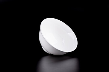 Fototapeta na wymiar White porcelain bowl isolated on white background.