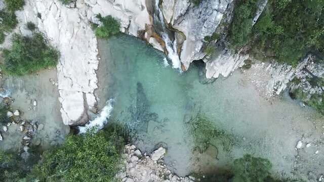 drone view of the Borosa riverbed and natural pools. Located in the Natural Park of the Sierras de Cazorla, Segura y las Villas, Spain.