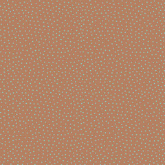 Polka dot fabric. An infinite number of blue dots on a brown background. Seamless coffee shade pattern for textiles, wrapping paper, pillows, bedding. 