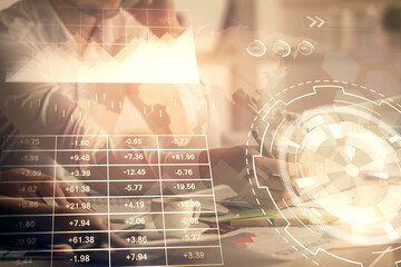 Multi exposure of man and woman working together and financial chart hologram. Business concept. Computer background.