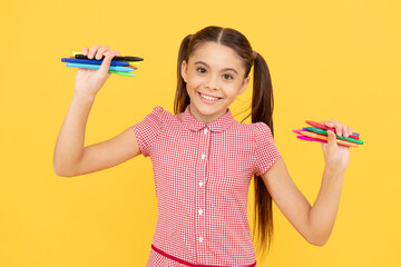 smiling child ready to draw picture. office supplies for school. stationery for painting.