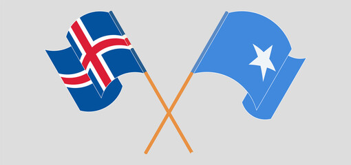 Crossed and waving flags of Iceland and Somalia