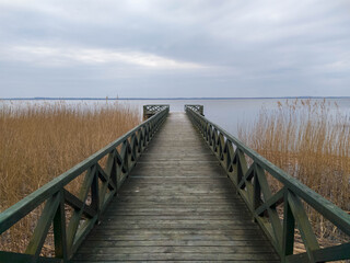Pier on Leba lake in Slowinski national park, northern Poland (Baltic coast)