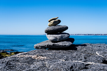 Cairn at New England beach. 