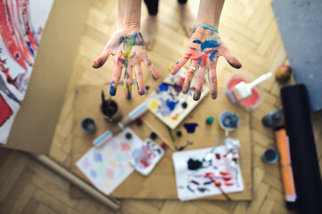 Fototapeta premium Colours on painter hand. 